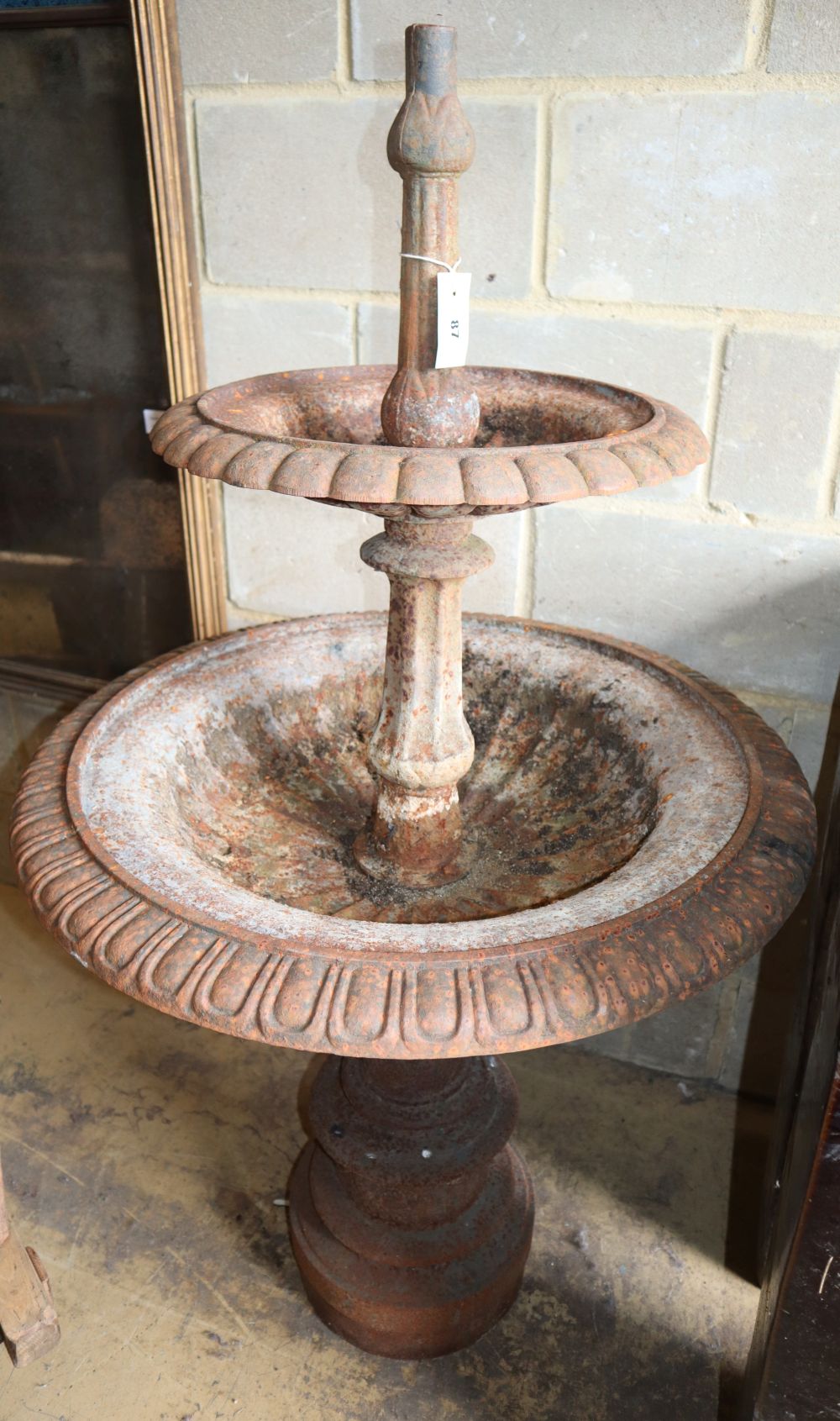 A Victorian cast iron two tier garden fountain, H.140cm